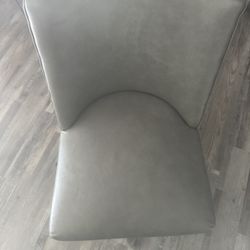 Grey Faux Leather Swivel Chair On Wooden Legs