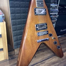1970’s Harmony Flying V Made in Japan plays and sounds good.  Body: Maple cap with mahogany body Neck: Mahogany neck with a "C" profile, 1 5/8" wide n