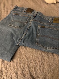 2 Pairs Men’s Lee Jeans. $30