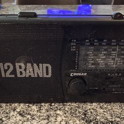 Cougar 12 Band World Receiver H123. AM/FM tested And Working Well. Good condition, clean battery compartment.