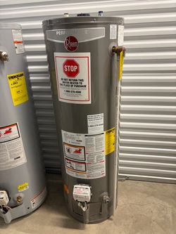 Used Rheem 40 gallon gas water heater can be installed and or delivered as well for and additional price