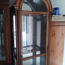 Curio Cabinet By Howard Miller Clock Company