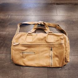 17"×12"×7" tan leather weekend duffel bag, good condition, back side zipper part missing