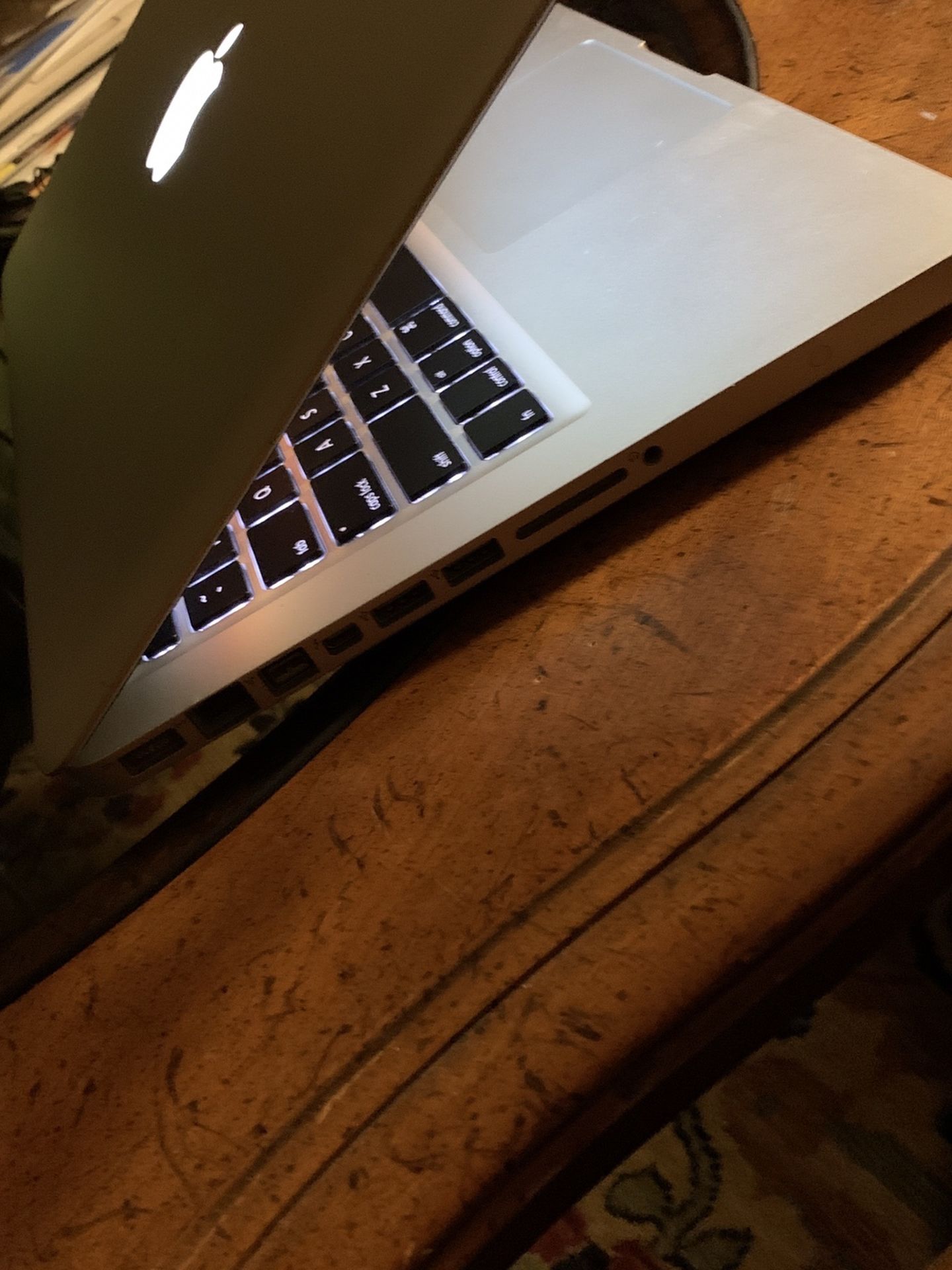 Apple MacBook Pro 13 Inches Core I5, Processor, 4 GB Ram, 500 GB Storage $350