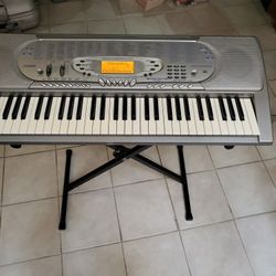 Casio Electronic Key Board,W/ Stand And Plug.