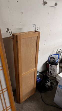 Concealable ironing board