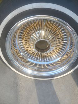 14x7 wire rims center golds