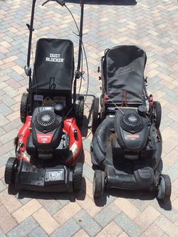 Two 160 cc Honda lawnmower ENGINES on rusted through decks for sale