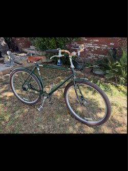 Raleigh Tourist classic city bike with a brown leather saddle seat in great shape