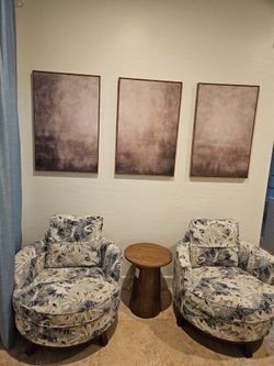 Set of two swivel accent chairs