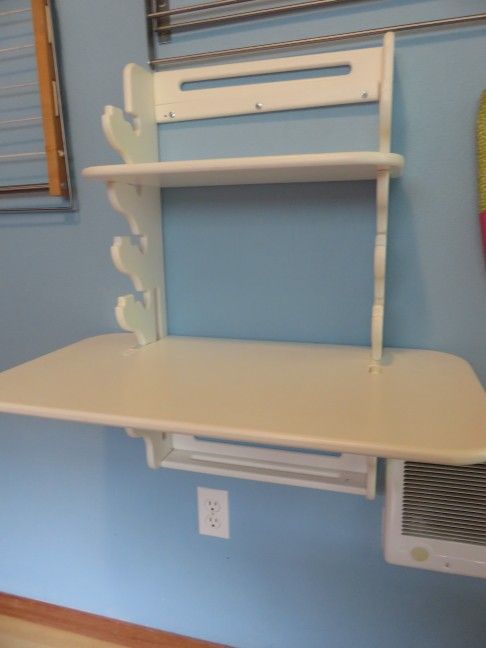 Adjustable hanging sit/stand desk.