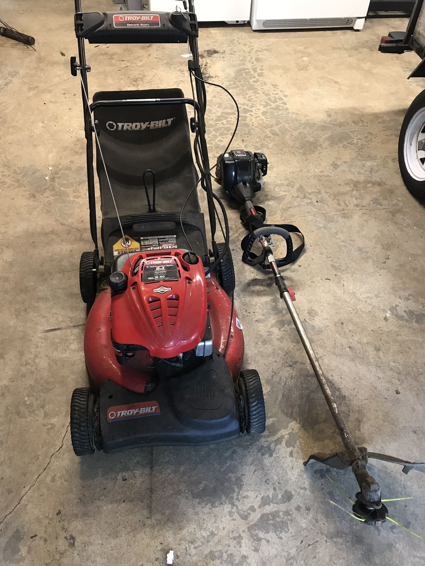 Troy Built lawn mower and weed whacker