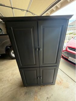 Black wood armoire/wardrobe