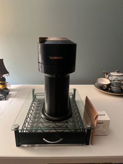 Nespresso machine with stand/pod holder