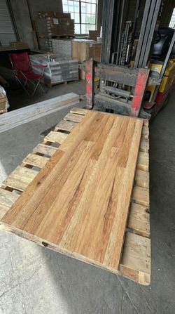 Light Oak Laminate Floors - $0.70/sqft