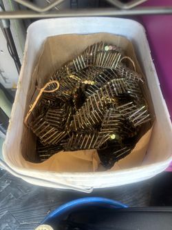 Bucket full of roofing nails