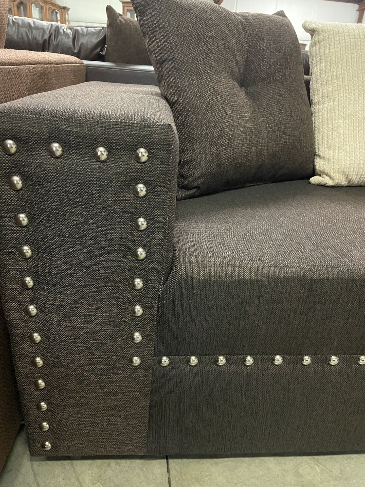 Two piece sectional. WEEKS FURNITURE. 933 Wappoo Rd. in West Ashley