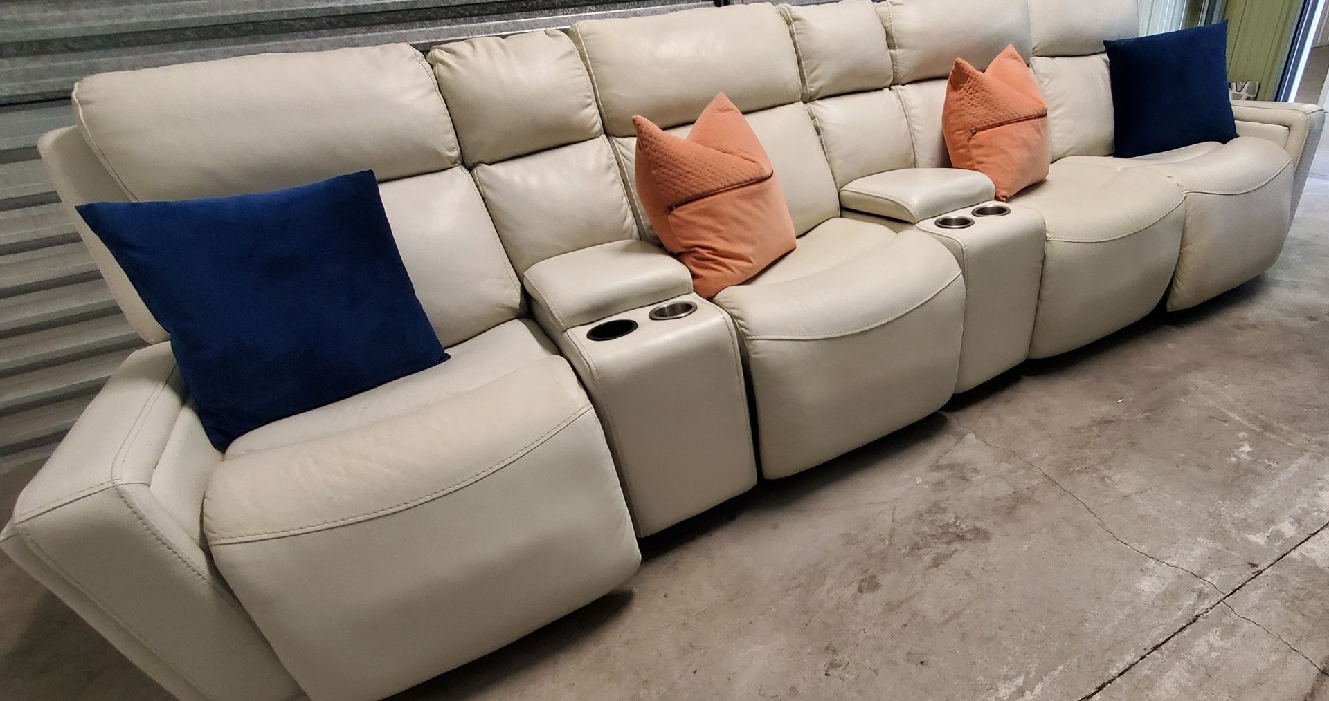 Beautiful, elegant, upscale, luxury cream, all Italian leather, all electric powered sectional sofa with triple recliners, and triple powered hed head