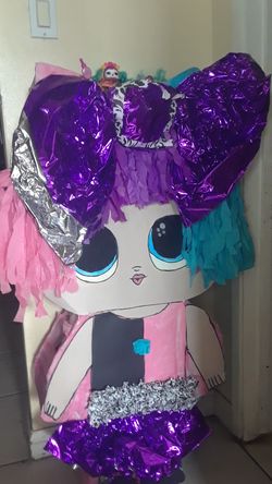 Pinata with lol dolls are included