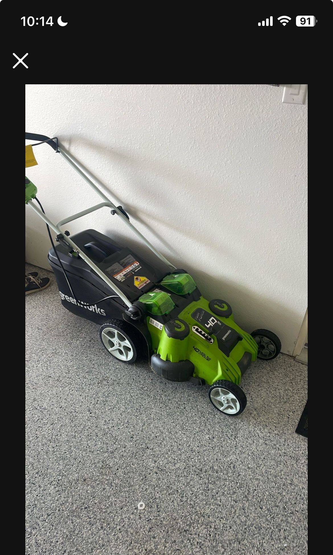 2 years old electric lawn mover . Original $375 now sale 50