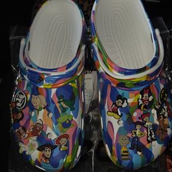 Crocs with charms size Womens 10 mens 8 SEGUIN AREA