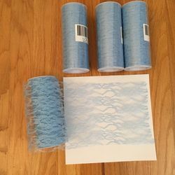 Light blue and light gold tulle fabric + gold satin ribbon