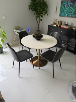 CB2 Round Dining Set — White Marble/Stone Top with Brass Pedestal Base + 4 Charcoal Chairs