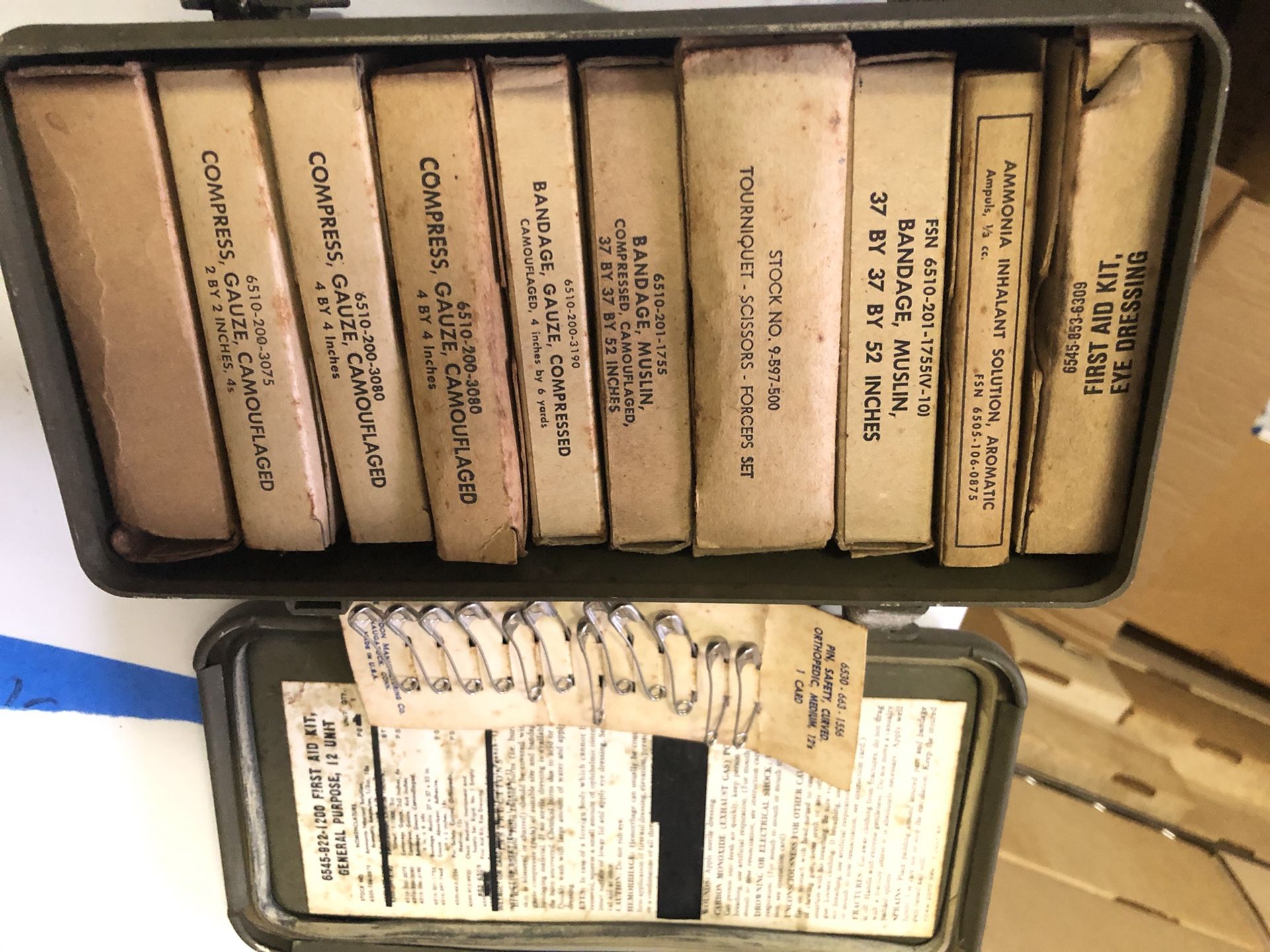 Early Vietnam era vehicle 12 piece general first aid kit