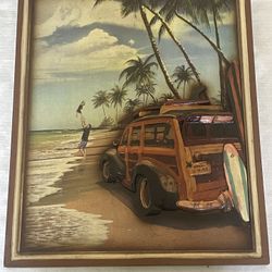Framed diorama of a woodie wagon on a beach with surfboards. 17.5”x 14.25” Including Frame
