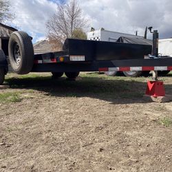 2022  BIG TEX  20’ EQUIPMENT FLATBED TRAILER ON  2-7K AXLES 