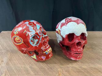 2 decoration painted resin/plastic skulls
