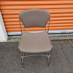 Brown Upholstered Chair - Reclining Back & Stackable