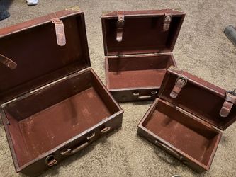 Nesting faux leather steamer trunks