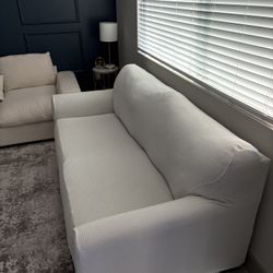 Grey Couch With White Cover