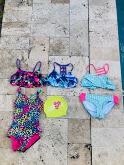 Girls bathing suits sizes range from 11-14
