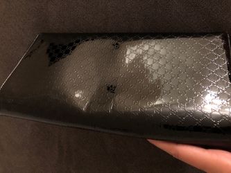 Gucci clutch with GG Pattern