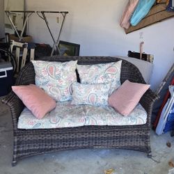 Wicker Loveseat with Cushions & Pillows – $40