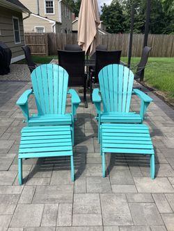 Set of Adirondack chairs with matching ottomans 4 piece set
