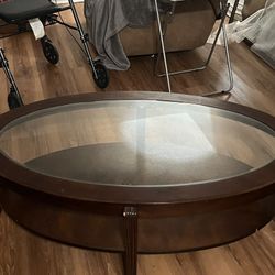 Glass and wood cocktail table.