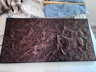 Cool metal relief sculpture of horses
