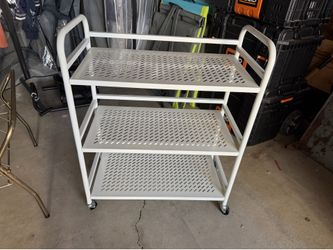 Used white rack shelf metal wheels