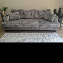 Grey Couch with Charger & Pockets