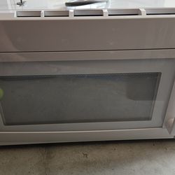 White Microwave (magic chef) over the range microwave with exhaust
