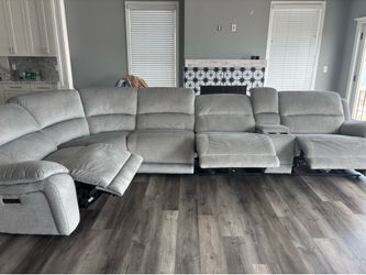grey electric section with recliner couch