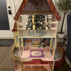 KidKraft Disney Princess Beauty & the Beast Belle Dollhouse; 46.5” tall x 30” wide