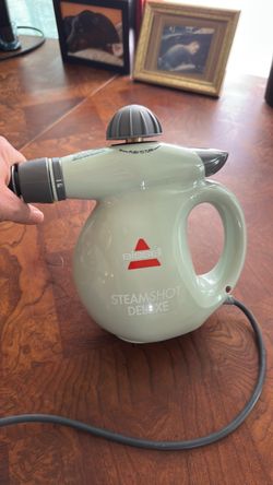 Never used new Bissell steam shot Delux