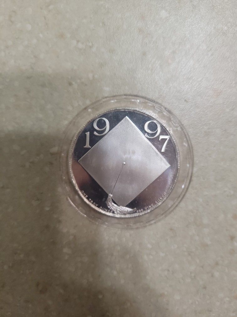 1997 Graduation Theme 1 Oz 999 Silver Coin.  Sealed 