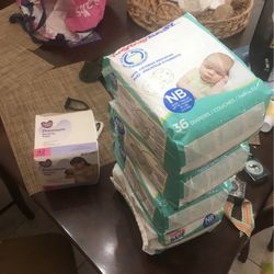 Newborn Diapers And Nursing Pads All For 20$
