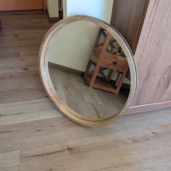 Round wooden frame mirror