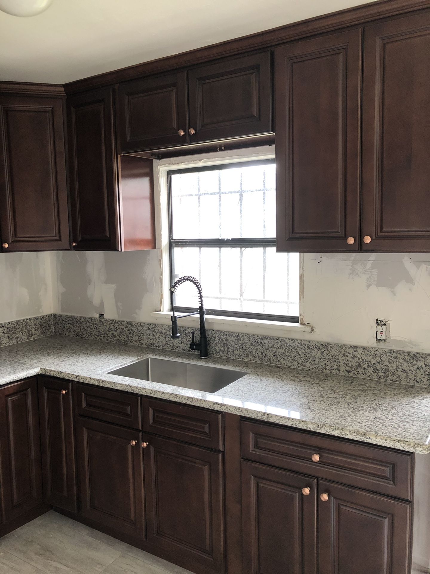 Cabinets, granite and quartz